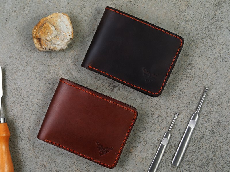 Two Stagr wallets beside the tools that made them