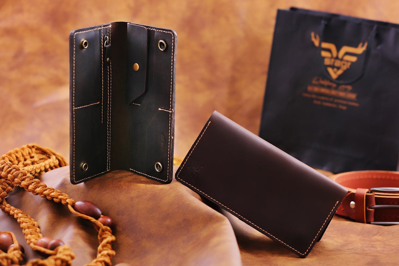 A Stagr long wallet open beside its box