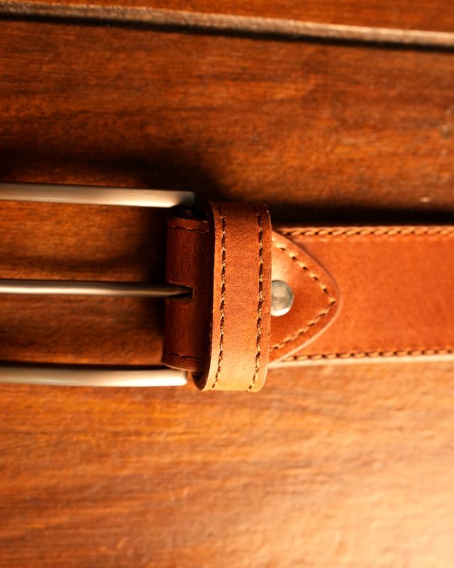 FIG. 04 · Finished belt, buckle on